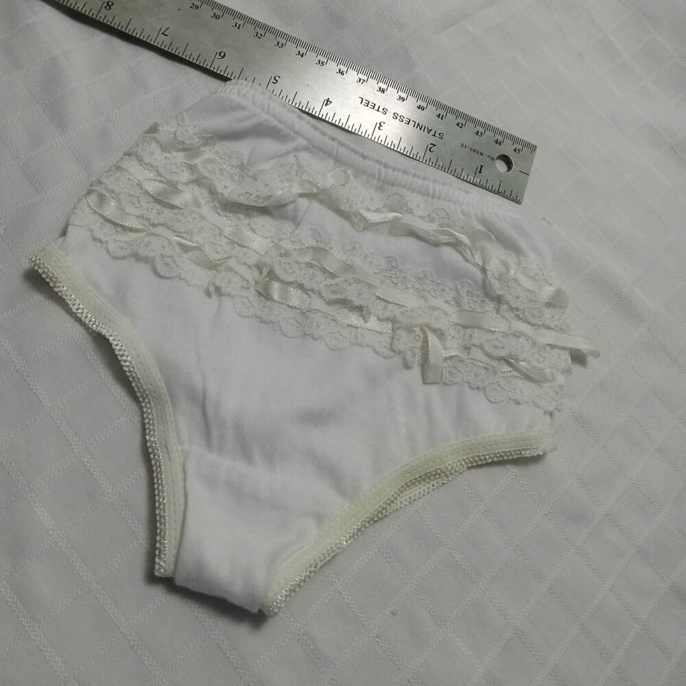 Vintage-style diaper cover with ruffles at the back, stretchy, 2005